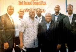 Pastor Poré hosting a Gospel Explosion at Carol Vance Prison posing with Alex Shannon and The Christian Voices